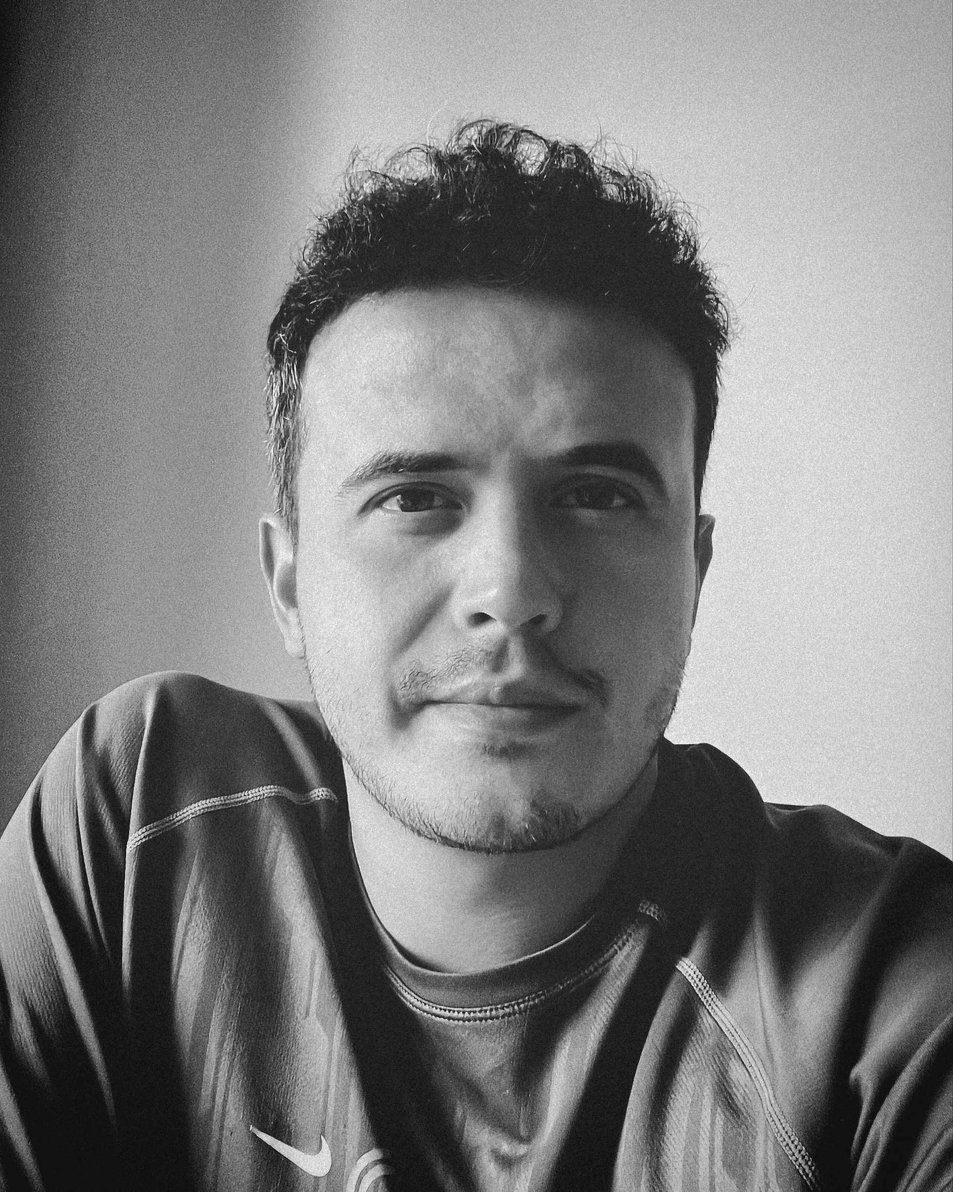 Black-and-white portrait of Selman Bağırıcı